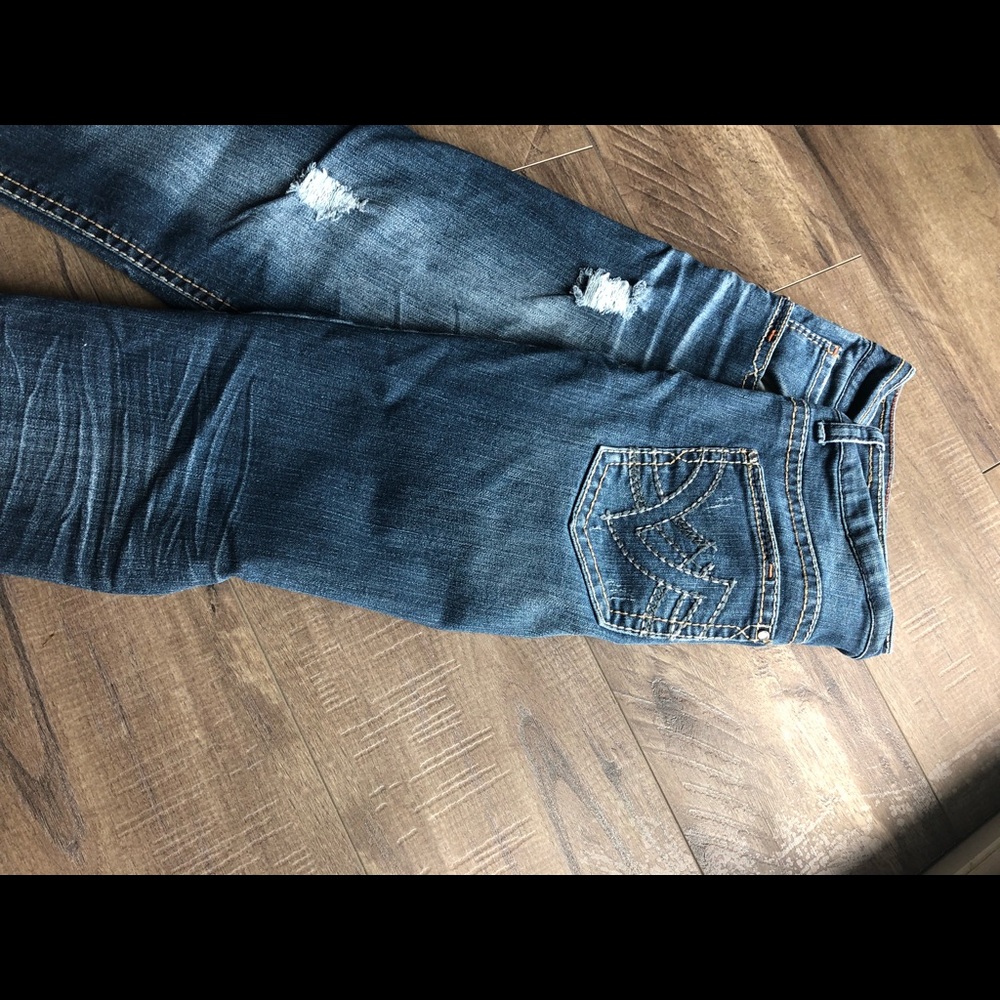 Hydraulic Distressed Jeans